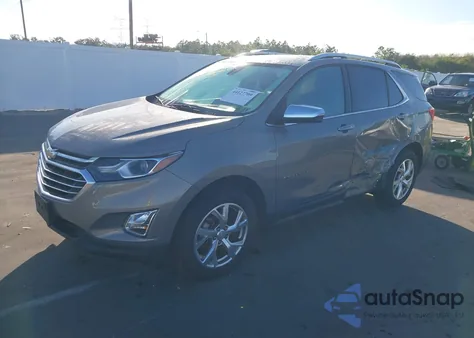 2018 Chevrolet Equinox Premier z USA, uszkodzony, nr VIN 3GNAXVEV3JS620540